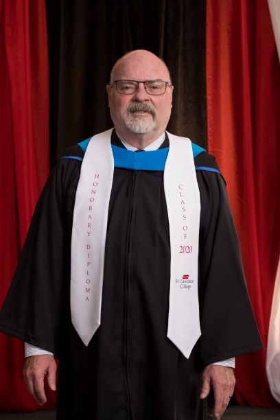 John McDonald is pictured in Convocation regalia